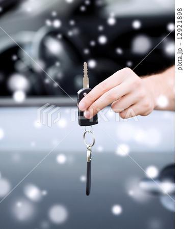 close up of man with car key outdoors close up of man with car key outdoors 12921898