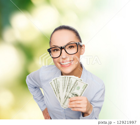 smiling businesswoman with dollar cash money 12921997