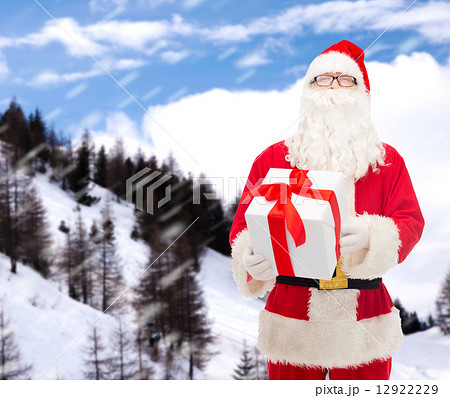 man in costume of santa claus with gift box man in costume of santa claus with gift box 12922229