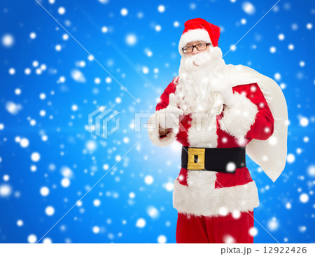 man in costume of santa claus with bag man in costume of santa claus with bag 12922426