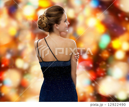 smiling woman in evening dress smiling woman in evening dress 12922490