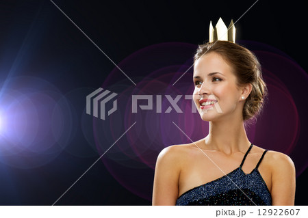 smiling woman in evening dress wearing crown smiling woman in evening dress wearing crown 12922607
