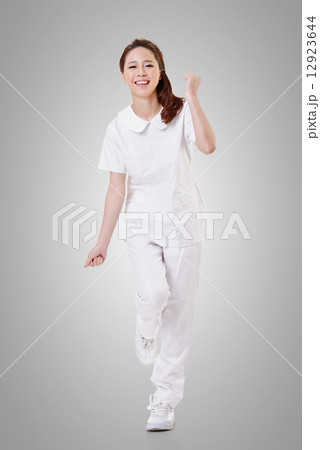 Cheerful Asian nurse Cheerful Asian nurse 12923644