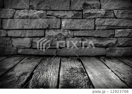 old Wooden floor with grunge stone wall in the dark 12923706