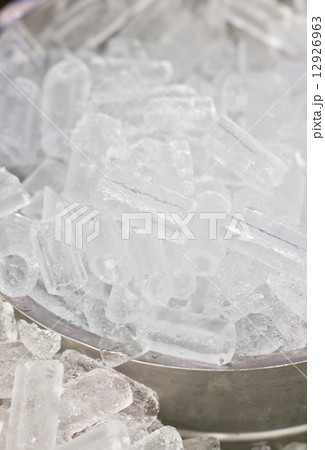 Ice in metallic bowl. 12926963