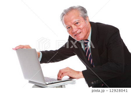 white background,old man, studio shot, businessman, portrait, suit, senior, formal, office, laptop   12928041