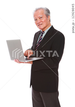 white background,old man, studio shot, businessman, portrait, suit, senior, formal, office, laptop   12928045