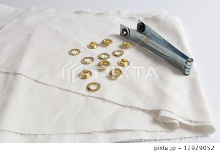 Rivets on light white cloth 12929052
