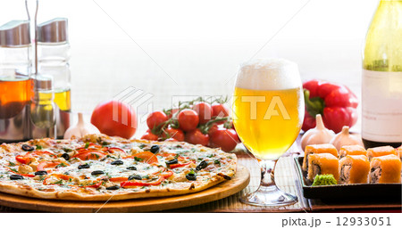 composition of beer sushi  and pizza 12933051