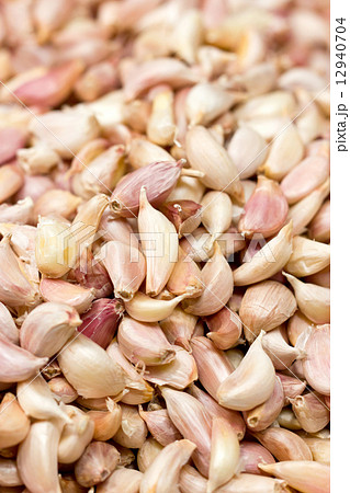 Full frame of many organic garlic cloves. 12940704