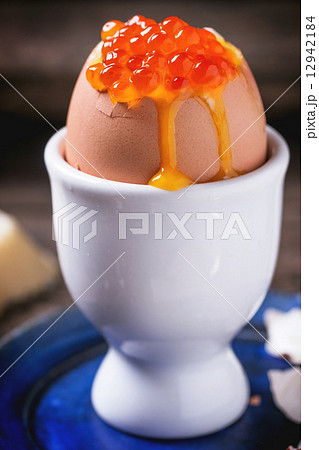 Soft-boiled egg with red caviar Soft-boiled egg with red caviar 12942184