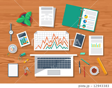 Top view of workplace with laptop and devices 12943383