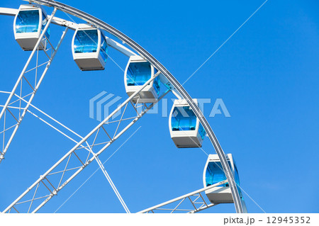 Ferris wheel on blue sky background Ferris wheel on blue sky background 12945352