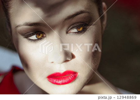 Young beautiful japanese woman with red dress Young beautiful japanese woman with red dress 12948869