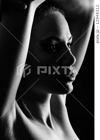 Beautiful young woman with green eyes 12949312