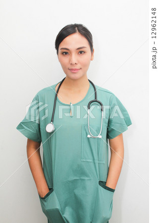 Asian female medical surgeon posing Asian female medical surgeon posing 12962148