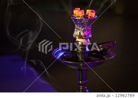 Hookah with burning coals in the night 12962769