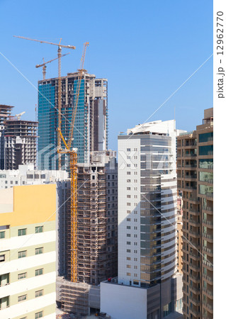 Modern office buildings and hotels are under construction 12962770