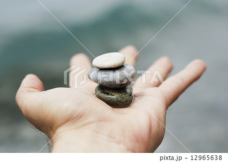 Gravel pile in woman hand Gravel pile in woman hand 12965638