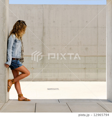 Young woman wearing denim jacket Young woman wearing denim jacket 12965794