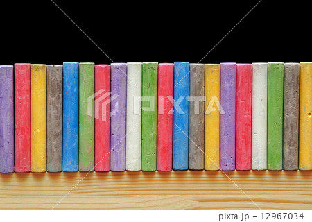 Color chalks arranged in line 12967034