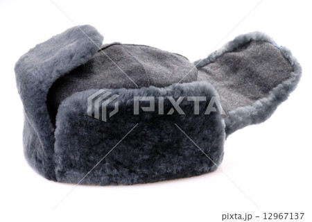 Russian fur hat with ear-flaps isolated Russian fur hat with ear-flaps isolated 12967137