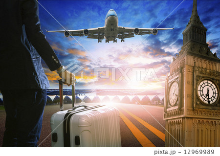 business man and luggage standing in airport and passenger jet p 12969989