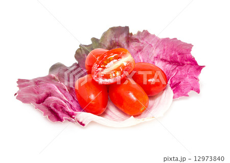 Cherry Tomatoes with Radicchio leaf isolated on white. 12973840