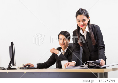 Secretary bringing manager coffee 12975744