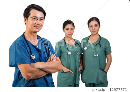 Surgical team led by a male surgeon 12977771
