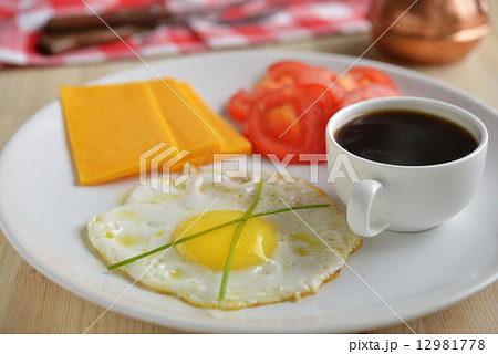 Breakfast with egg and coffee Breakfast with egg and coffee 12981778