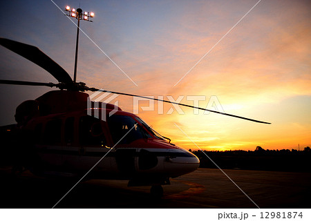 silhouette of helicopter on the apron silhouette of helicopter on the apron 12981874