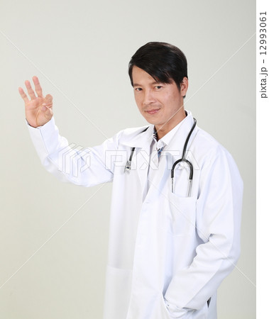 Male Doctor Showing OK Sign 12993061