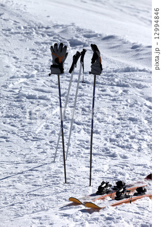 Skiing equipment on ski slope at sun day Skiing equipment on ski slope at sun day 12994846