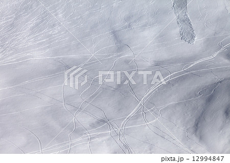 Off piste slope with traces of skis, snowboarding and avalanche Off piste slope with traces of skis, snowboarding and avalanche 12994847