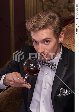 Handsome man with cigar Handsome man with cigar 12995016