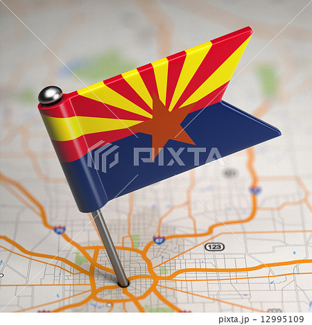 Arizona Small Flag on a Map Background. Arizona Small Flag on a Map Background. 12995109