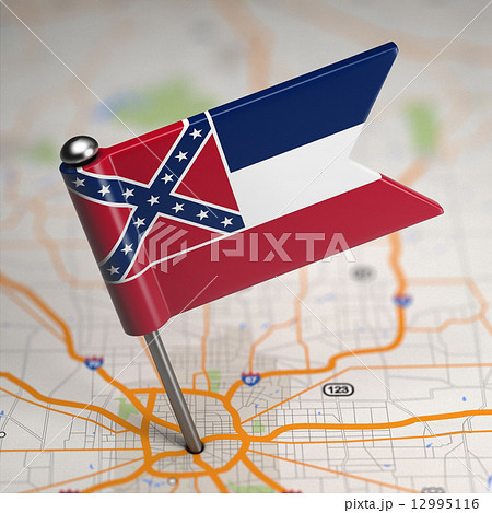 Mississippi Small Flag on a Map Background. 12995116