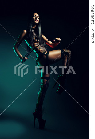 sexy woman in striped body with whip sexy woman in striped body with whip 12995961