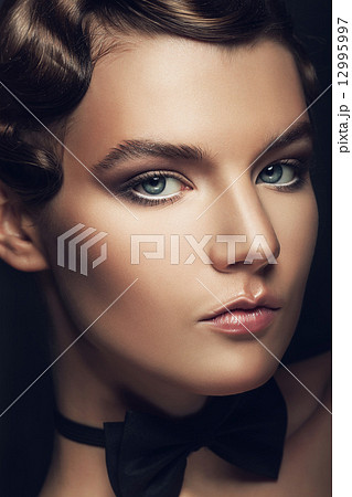 portrait of retro woman with curly hairstyle 12995997