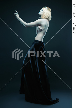 tall woman in black skirt 12996021