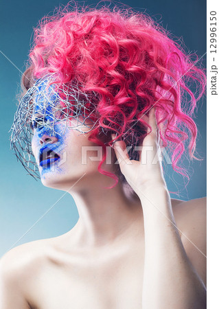 woman with wire web and pink hair woman with wire web and pink hair 12996150