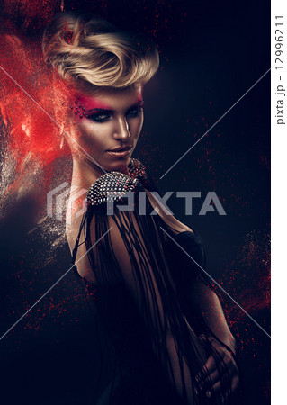 blonde woman with red powder 12996211