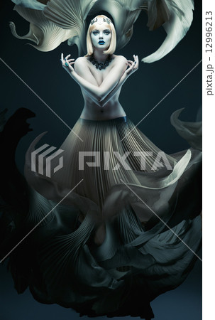 white blond woman in long dynamic skirt 12996213