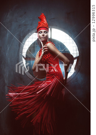 passion woman in red dress in circle of light passion woman in red dress in circle of light 12996315