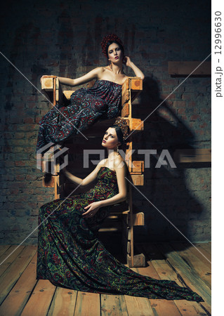 Two women on the scaffolding 12996630