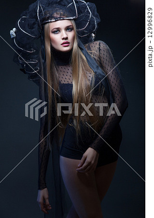 long hair woman in black 12996829