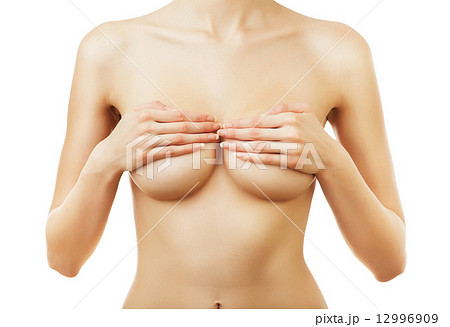 naked woman with hands on breasts 12996909