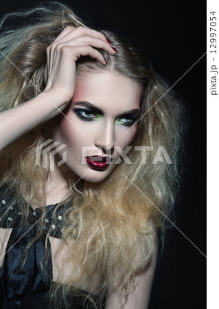 Woman with a passionate look Woman with a passionate look 12997054