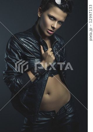 Stylish woman in a leather jacket Stylish woman in a leather jacket 12997133